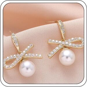 Elegant Gold and Pearl Bow Earrings